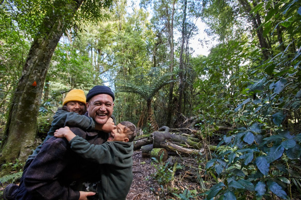 Family pictured in Ōtanewainuku Forest